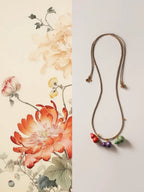 Amara Lacquer Gourd Charm Necklace