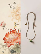 Amara Lacquer Gourd Charm Necklace
